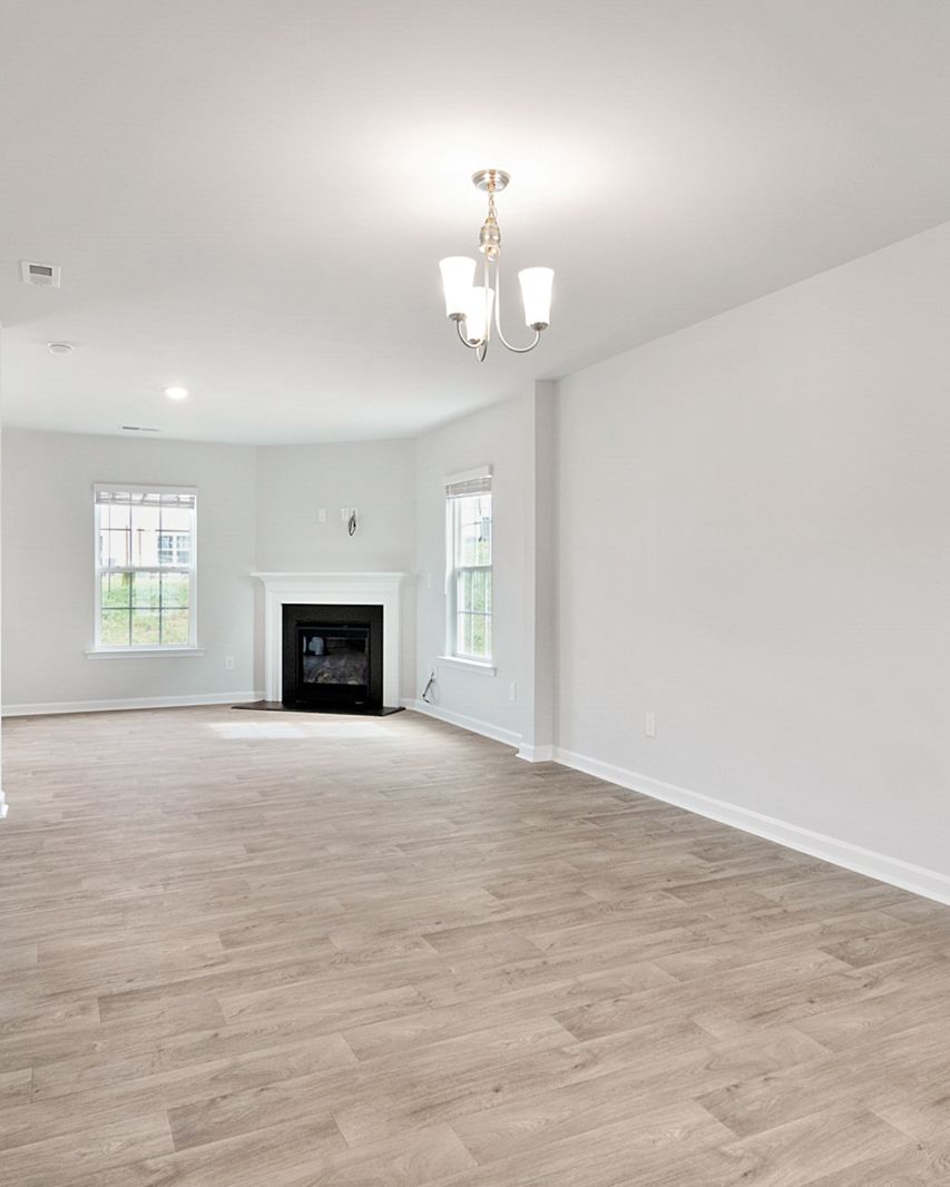 Illustrative photo: a quiet, empty living room